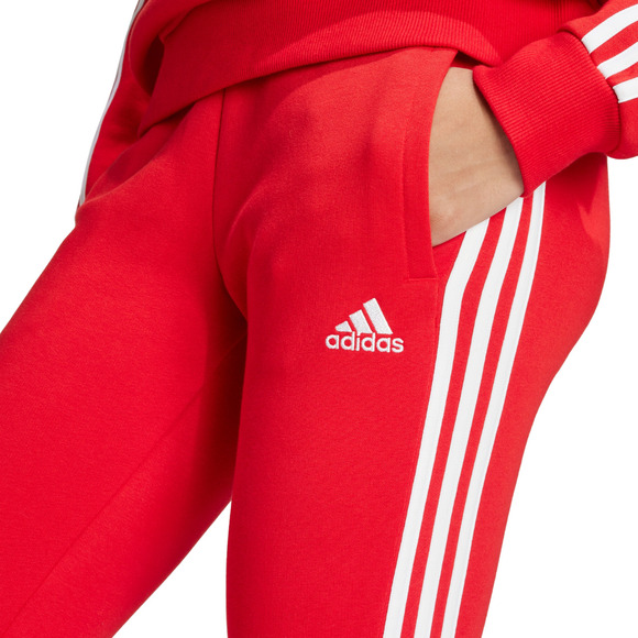 Spodnie damskie adidas Essentials 3-Stripes Fleece czerwone IY1719