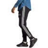 Spodnie męskie adidas Essentials French Terry Tapered Cuff 3-Stripes czarne HA4337